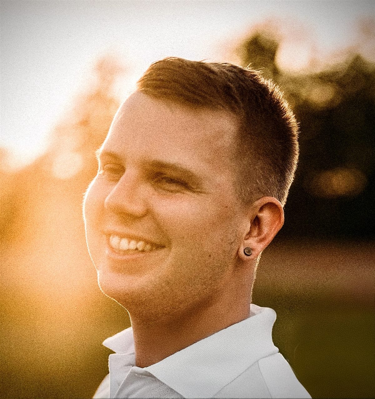 Tino Kaartovuori, smiling, in low evening light